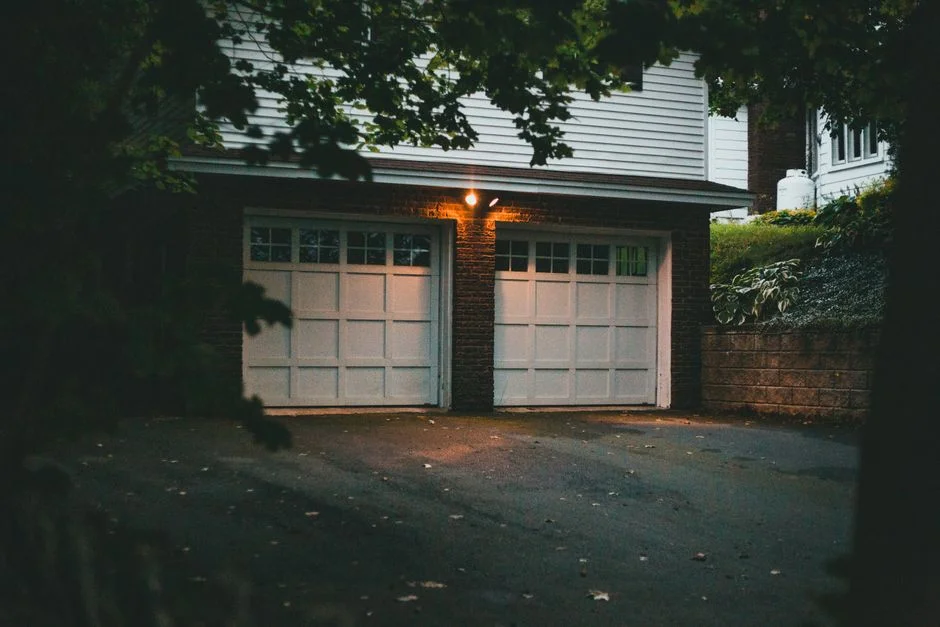 Off-track garage door realigned
